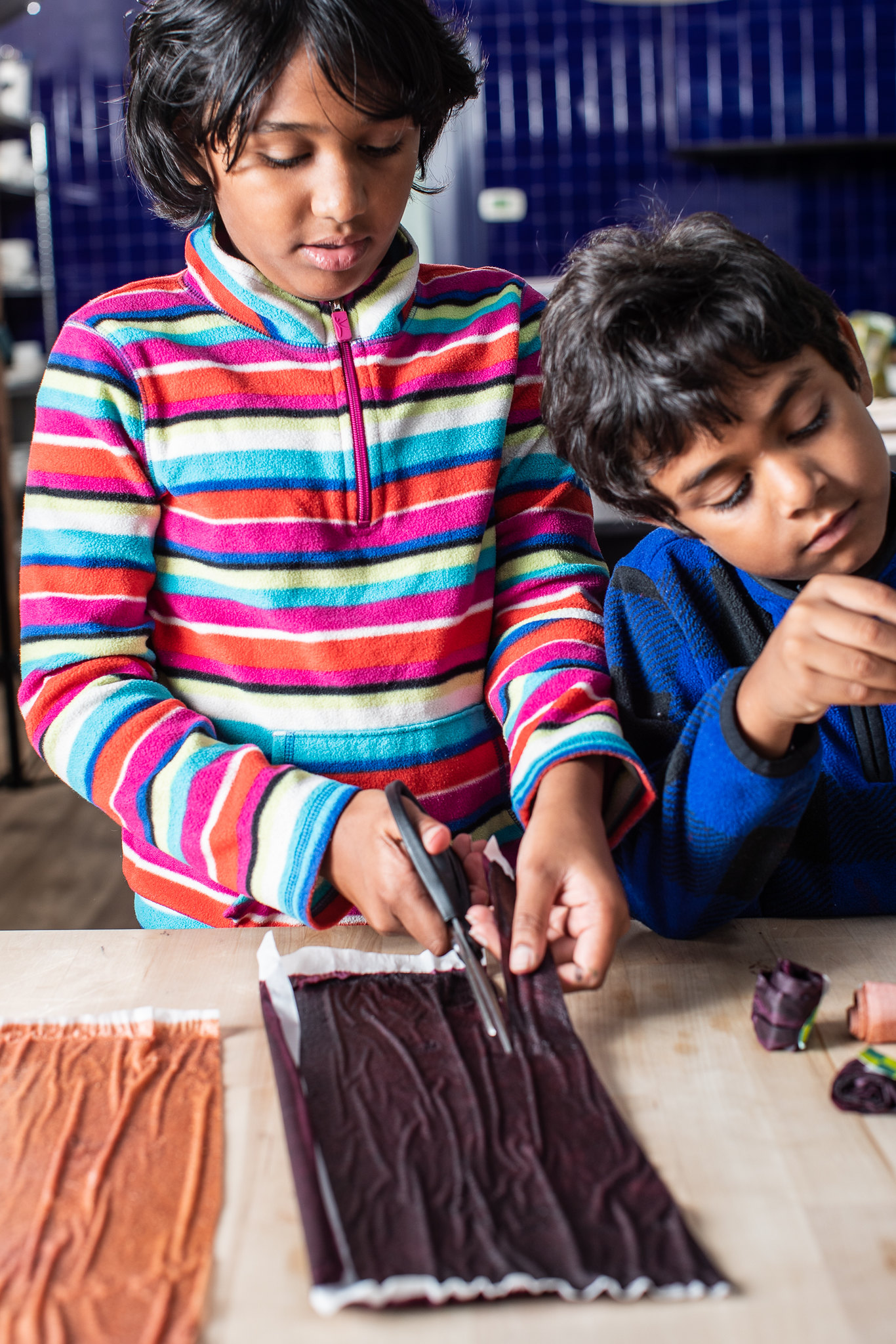 Children making fruit leather