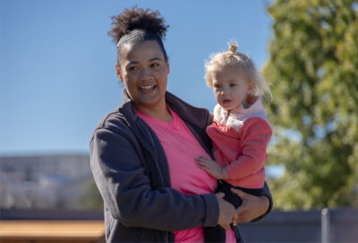 Texas A&M Children's Centers staff member working with kids.